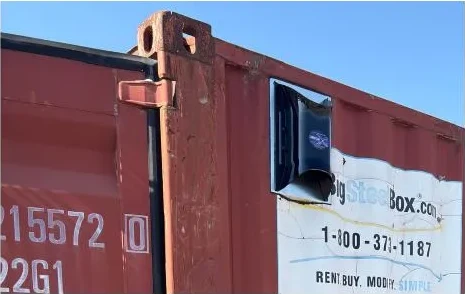 DRY-CON X exhaust installed on the side wall of a red container using an adapter plate
